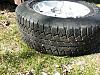 Four (4) 18 inch Chevrolet rims with P265/65/18 Bridgestone tires-tire-2-tread.jpg